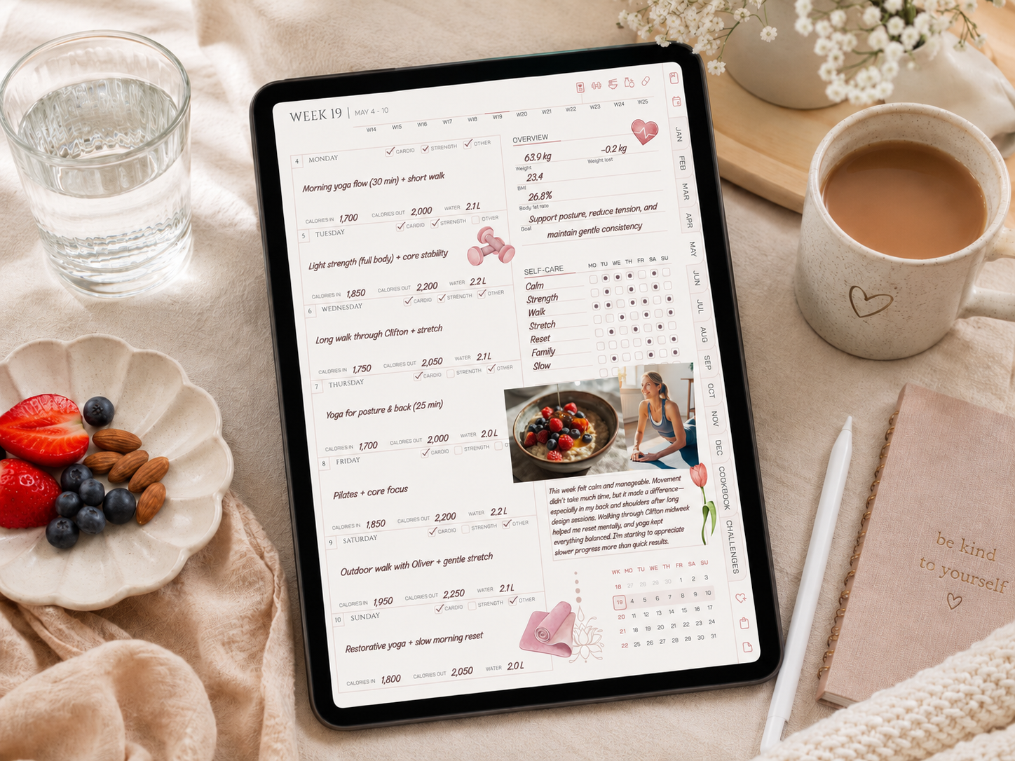 iPad fitness planner with daily wellness tracking for movement, meals, water, mood, sleep, and